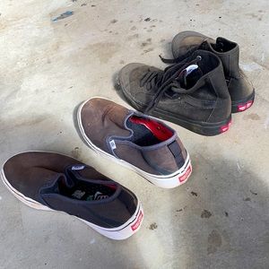 Vans black slip ons and midtops